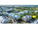 Aerial view of waterfront community, highlighting the subject property and resort-style amenities at 10311 Lands End Cir # 13, Placida, FL 33946