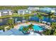 Aerial view of community pool and waterfront property at 10311 Lands End Cir # 13, Placida, FL 33946