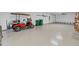 Garage with epoxy floor and golf cart at 10311 Lands End Cir # 13, Placida, FL 33946