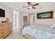 Spacious main bedroom with en-suite bathroom and water views at 10311 Lands End Cir # 13, Placida, FL 33946