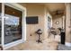Screened balcony with outdoor seating and grill at 10311 Lands End Cir # 13, Placida, FL 33946