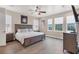 Main bedroom with king-size bed, and large windows at 10311 Lands End Cir # 13, Placida, FL 33946