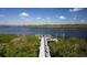 Enjoy waterfront access from this private pier at 10311 Lands End Cir # 13, Placida, FL 33946