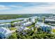 Aerial view of a luxury townhouse community by the water at 10311 Lands End Cir # 13, Placida, FL 33946