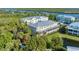 Aerial view of waterfront townhouses with a private pond at 10311 Lands End Cir # 13, Placida, FL 33946