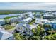 Aerial view showcasing a waterfront community of townhouses at 10311 Lands End Cir # 13, Placida, FL 33946