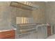 High-end stainless steel grill with built-in side burner at 12424 Davie Ct, Venice, FL 34293