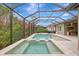 Enclosed pool and spa with screened patio at 12424 Davie Ct, Venice, FL 34293
