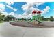 playground with modern equipment and covered pavilion at 12424 Davie Ct, Venice, FL 34293