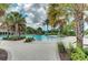 Relaxing pool area with water slide and spacious deck for lounging at 12424 Davie Ct, Venice, FL 34293