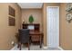 Small home office with desk and chair at 15658 Stuart Cir, Port Charlotte, FL 33981