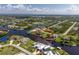 Single Gathering home with a large backyard, on a canal at 15658 Stuart Cir, Port Charlotte, FL 33981