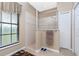 Walk-in shower with glass enclosure and modern tile at 15658 Stuart Cir, Port Charlotte, FL 33981