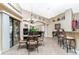 Charming breakfast nook with a round table and four ornate chairs, perfect for casual dining at 15658 Stuart Cir, Port Charlotte, FL 33981