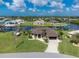 Single-Gathering home on a canal with a large backyard and dock at 15658 Stuart Cir, Port Charlotte, FL 33981