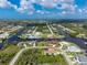 Bird's eye view of a single Gathering home in a residential neighborhood at 15658 Stuart Cir, Port Charlotte, FL 33981