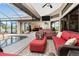 Enclosed patio with access to the pool and living room at 15658 Stuart Cir, Port Charlotte, FL 33981