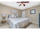 Spacious main bedroom with large bed and window at 15658 Stuart Cir, Port Charlotte, FL 33981