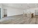 Spacious living room with wood-look flooring at 308 Capatola St, Port Charlotte, FL 33948