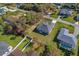 Aerial view of house and neighborhood, showcasing location at 308 Capatola St, Port Charlotte, FL 33948