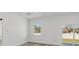Bright bedroom with sliding glass doors to backyard at 308 Capatola St, Port Charlotte, FL 33948