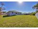 House with large backyard and grassy area at 308 Capatola St, Port Charlotte, FL 33948