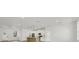 Modern kitchen with stainless steel appliances and an island at 308 Capatola St, Port Charlotte, FL 33948