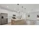 Modern kitchen with stainless steel appliances and light wood island at 308 Capatola St, Port Charlotte, FL 33948