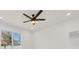 Bedroom with ceiling fan and window at 308 Capatola St, Port Charlotte, FL 33948