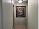 Light and bright hallway with a framed picture at 5160 Farewell St, Port Charlotte, FL 33981