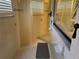 Bathroom with shower, tile flooring, and a hexagonal patterned floor mat at 5160 Farewell St, Port Charlotte, FL 33981