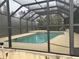 Relaxing screened-in pool in backyard oasis at 5160 Farewell St, Port Charlotte, FL 33981