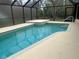 Relaxing pool with a screened enclosure at 5160 Farewell St, Port Charlotte, FL 33981