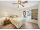 Bedroom with a queen bed and built-in shelving at 6297 Lori Ter, Port Charlotte, FL 33981