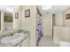 Bathroom with a sink, toilet, and shower at 12325 Mitchell Ter, Port Charlotte, FL 33981