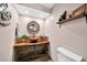 Unique bathroom with a wood-look vanity and vessel sink at 12325 Mitchell Ter, Port Charlotte, FL 33981