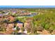 Bird's eye view of home and surrounding golf course community at 3113 Club Dr # 118, Port Charlotte, FL 33953