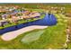 Aerial view of community near golf course and water features at 3113 Club Dr # 118, Port Charlotte, FL 33953
