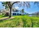 Spacious backyard with pond view and lush landscaping at 3113 Club Dr # 118, Port Charlotte, FL 33953
