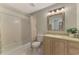 Clean bathroom with tub shower combo, toilet and single vanity at 3113 Club Dr # 118, Port Charlotte, FL 33953