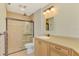 Bathroom with walk-in shower and single vanity at 3113 Club Dr # 118, Port Charlotte, FL 33953