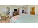 Main bedroom with king-size bed and large walk-in closet at 3113 Club Dr # 118, Port Charlotte, FL 33953