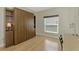 Guest bedroom with built-in Murphy bed and desk at 3113 Club Dr # 118, Port Charlotte, FL 33953