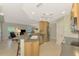 Eat-in kitchen with stainless steel appliances and ample counter space at 3113 Club Dr # 118, Port Charlotte, FL 33953