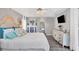 Bright bedroom featuring a comfortable bed and plenty of natural light at 10083 Kansas City St, Port Charlotte, FL 33981