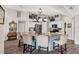 Updated kitchen with granite island, stainless steel appliances, and a breakfast bar at 10083 Kansas City St, Port Charlotte, FL 33981