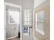 Clean bathroom with shower, window, and glass block feature at 10083 Kansas City St, Port Charlotte, FL 33981