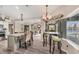 Modern kitchen with granite countertops, stainless steel appliances, and breakfast bar at 10083 Kansas City St, Port Charlotte, FL 33981