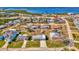 An aerial view showcasing the home's location in a residential neighborhood at 105 Crestview Dr, Englewood, FL 34223
