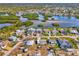 Aerial view showcasing the property's location within the neighborhood and its proximity to the water at 105 Crestview Dr, Englewood, FL 34223